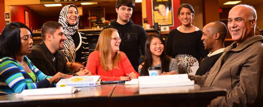 Diverse students laughing together